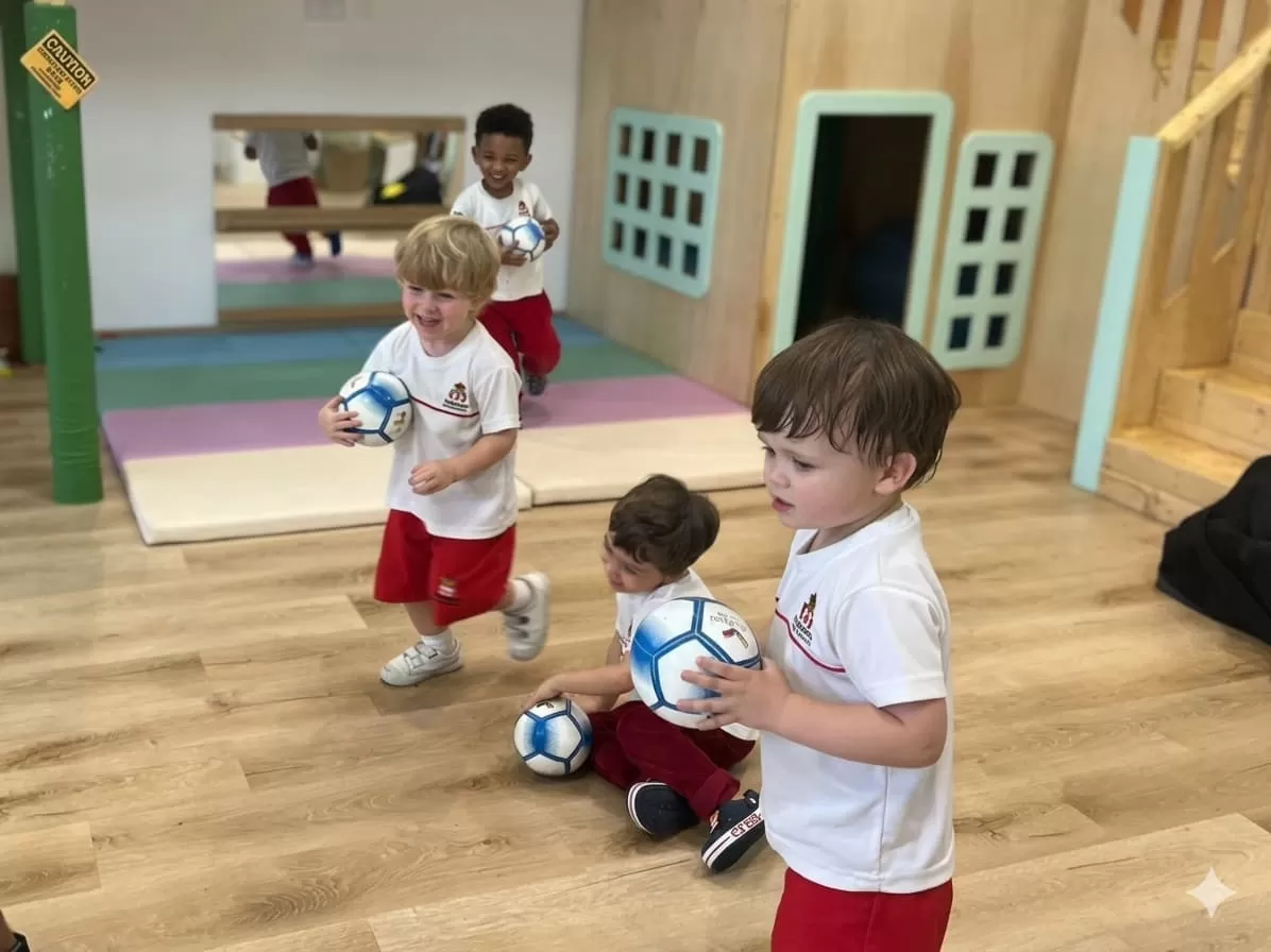 Toddlers with soccer balls
